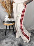 Pantalone bianco fasce rosse