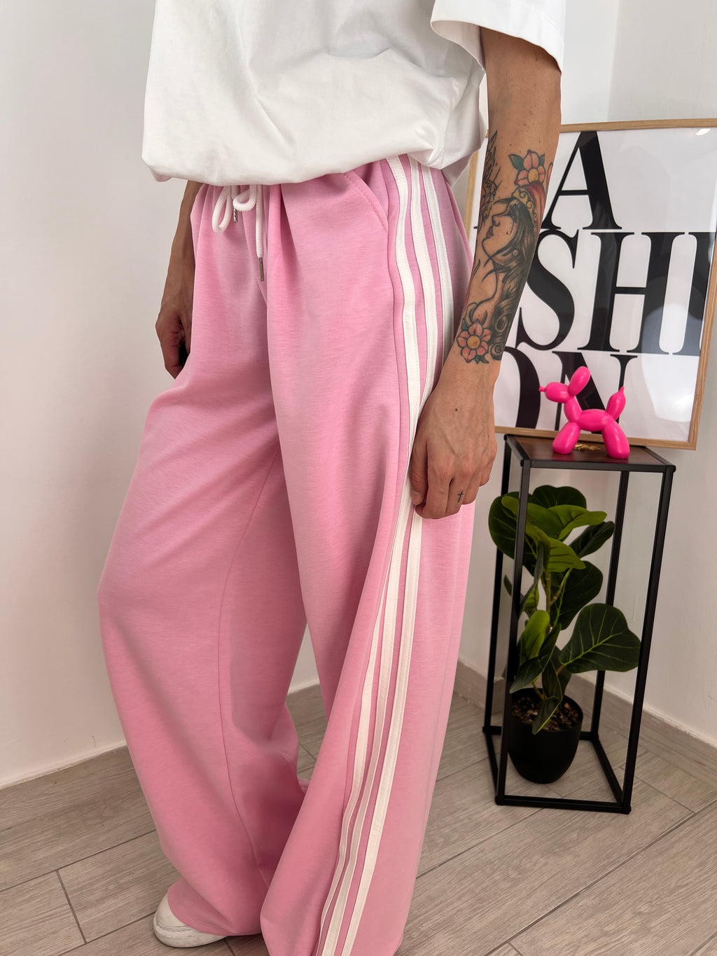 Pantalone rosa fasce bianche