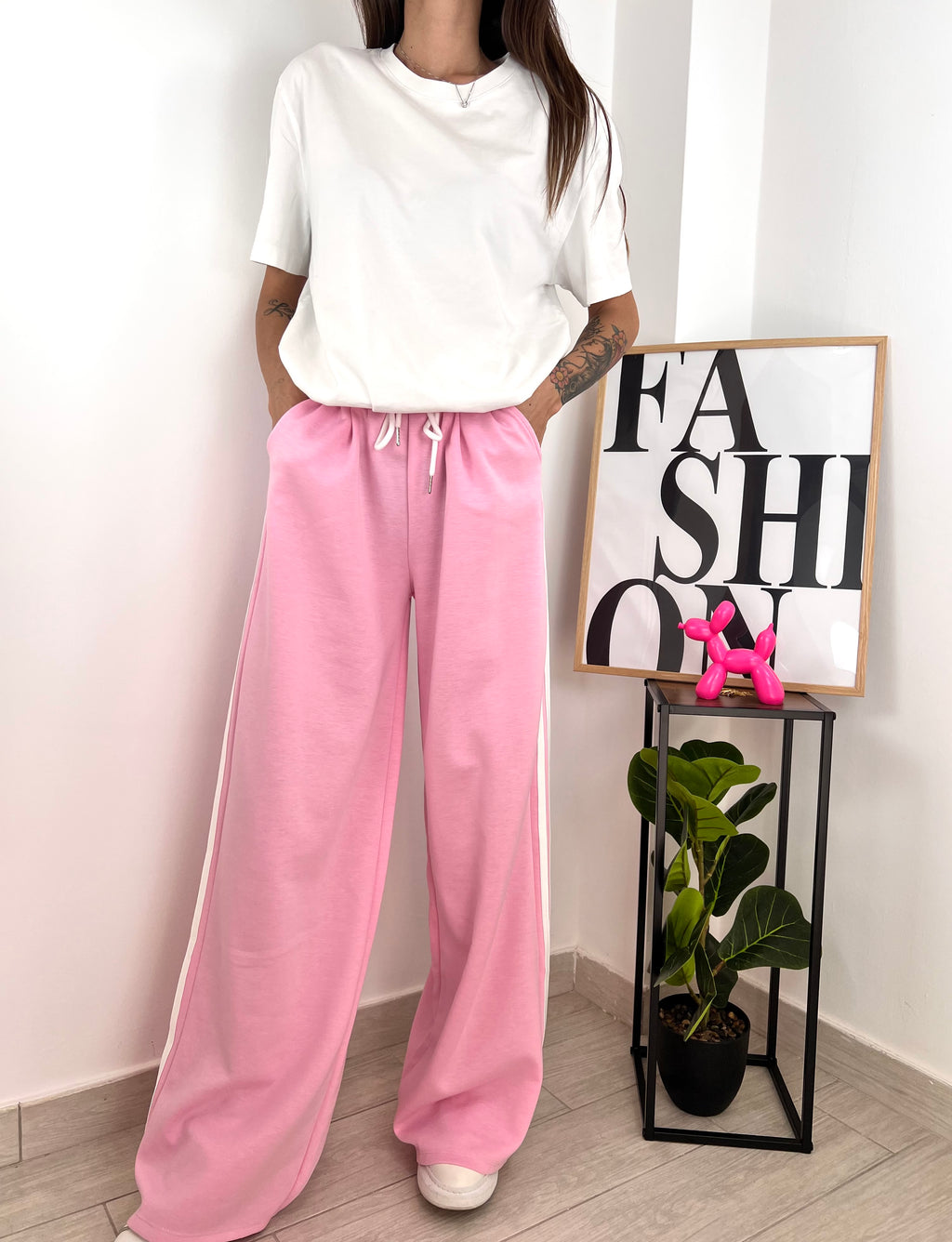 Pantalone rosa fasce bianche