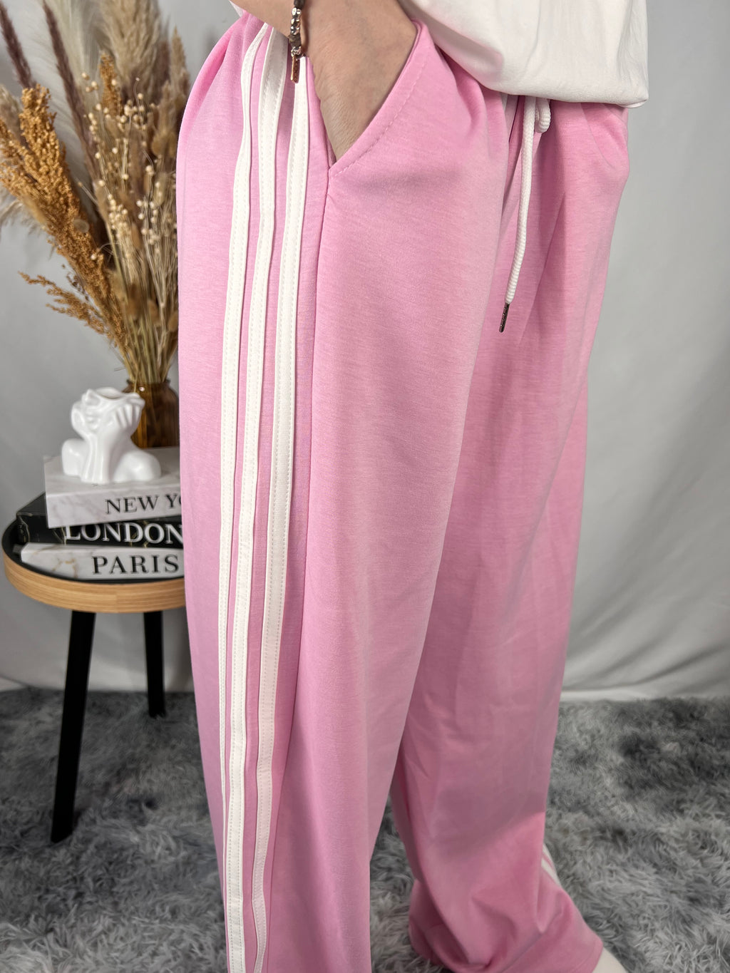 Pantalone rosa fasce bianche