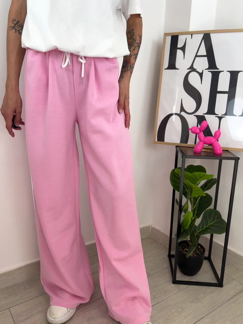 Pantalone rosa fasce bianche