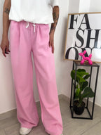 Pantalone rosa fasce bianche